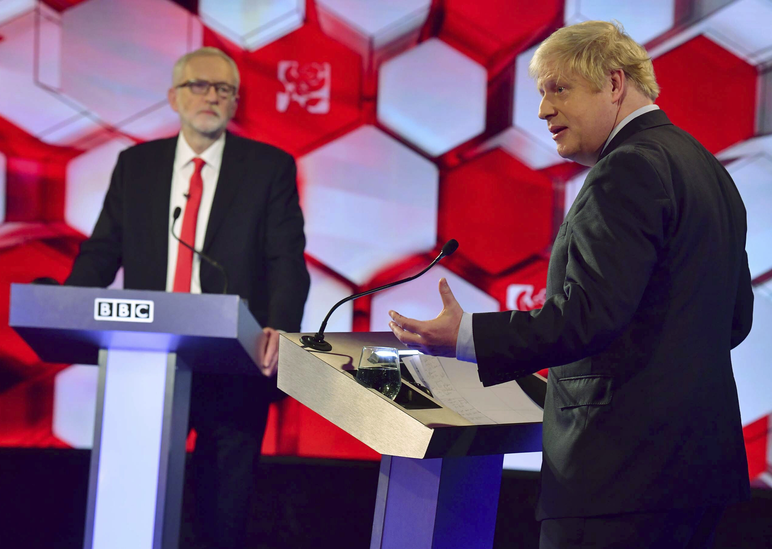 Opposition Labour Party leader Jeremy Corbyn, left, and Britain's Prime Minister Boris Johnson, during a head to head live Election Debate at the BBC TV studios in Maidstone, England, on Friday.