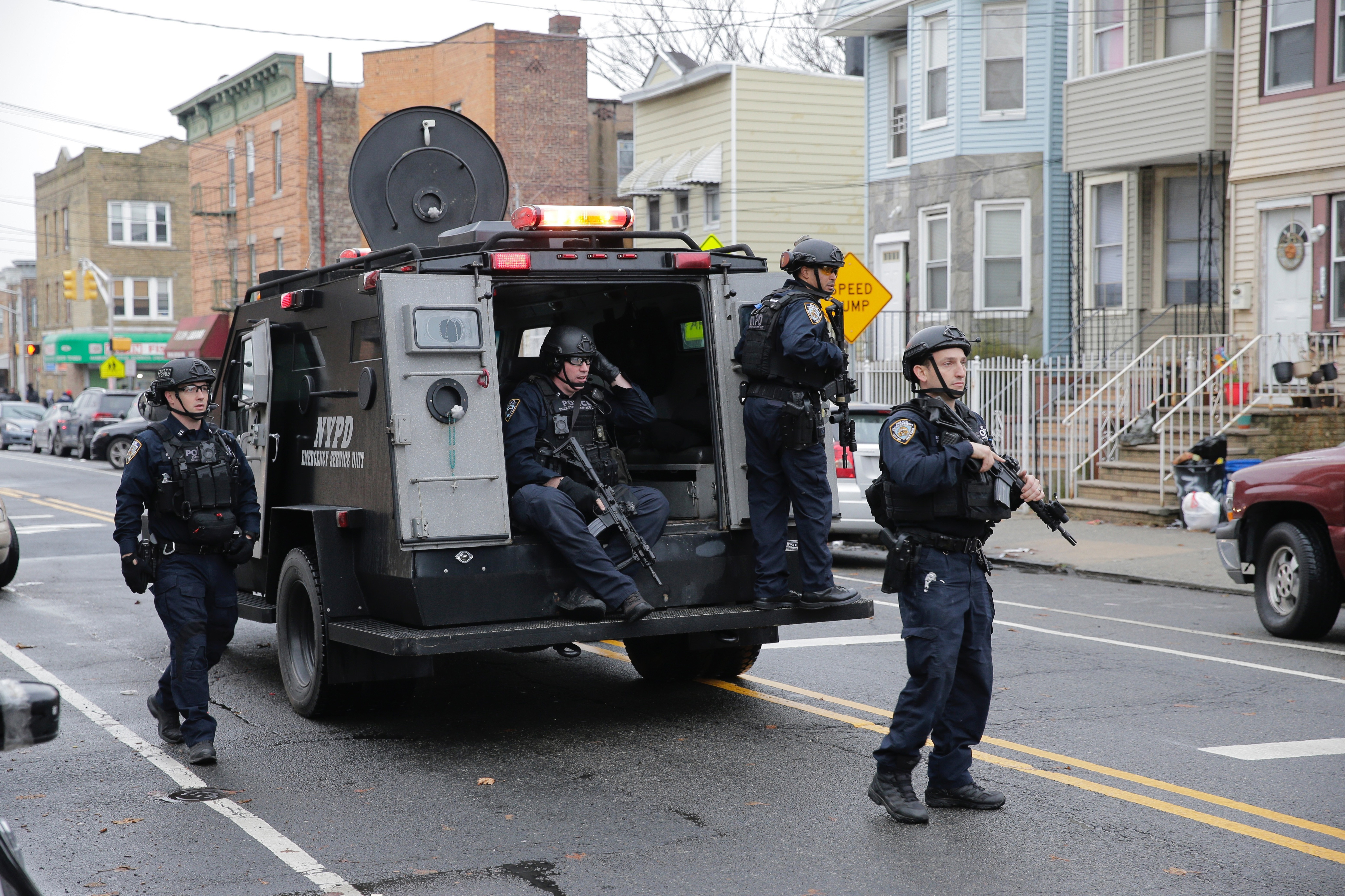 Law enforcement arrive on the scene following reports of shooting, on Tuesday.