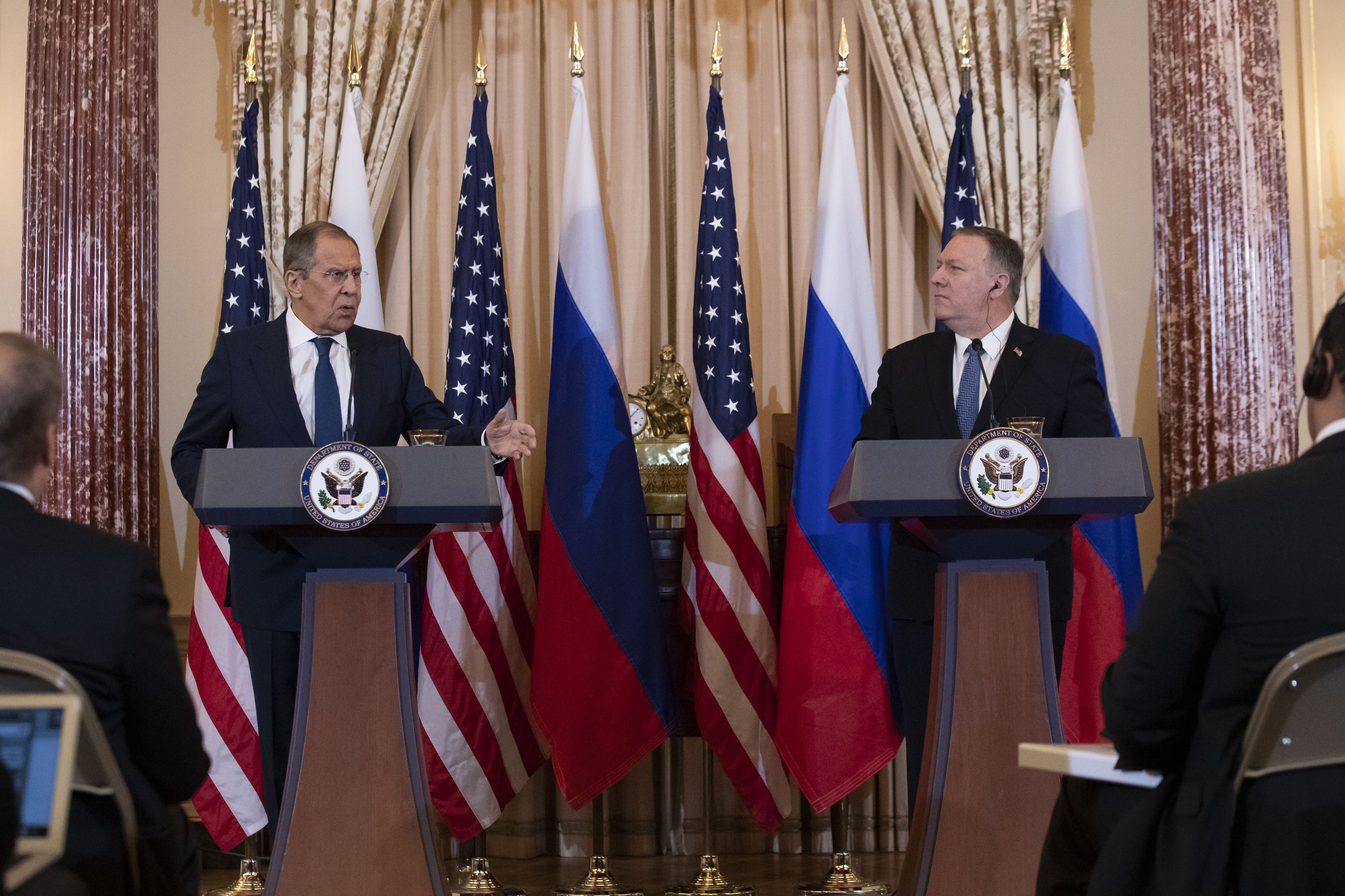 Russian Foreign Minister Sergey Lavrov, speaks as Secretary of State Mike Pompeo listens during a media availability after their meeting at the State Department, on Tuesday.