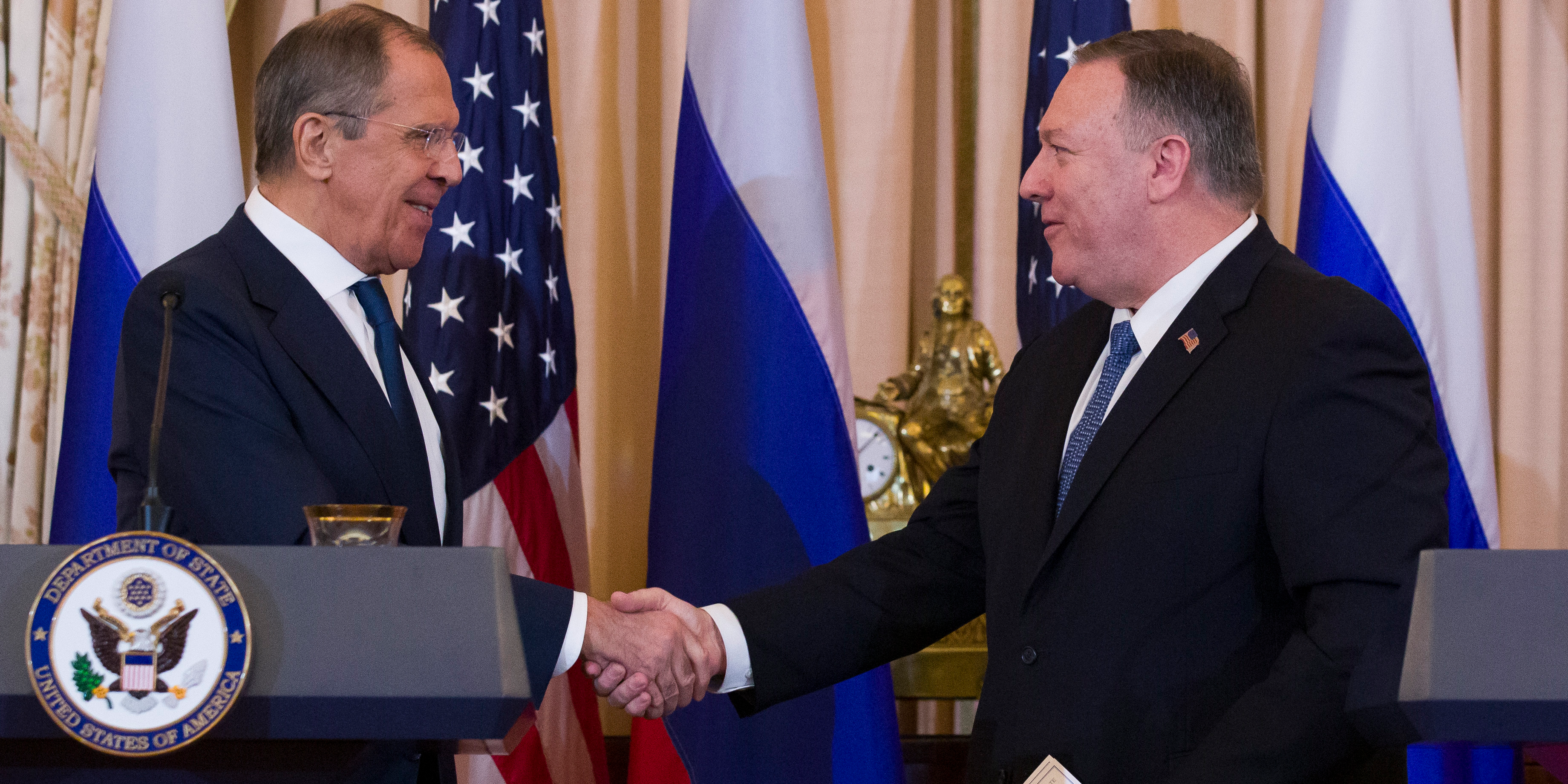 Secretary of State Mike Pompeo, right, shake hands with Russian Foreign Minister Sergey Lavrov after a media availability at the State Department, on Tuesday.