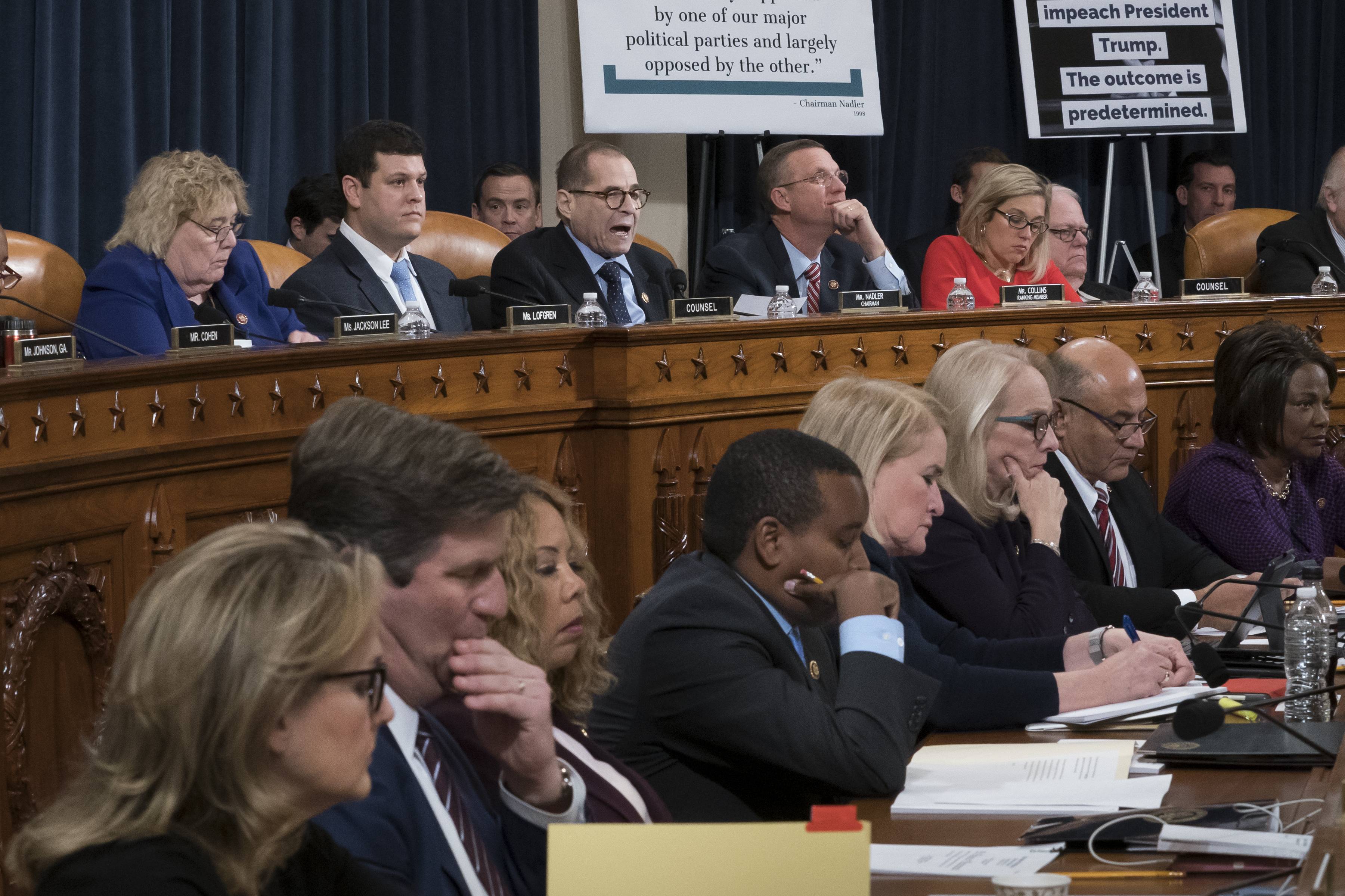 House Judiciary Committee ranking member Rep. Doug Collins, R-Ga., right, gives his opening statement during a House Judiciary Committee markup of the articles of impeachment against President Donald Trump, on Wednesday.