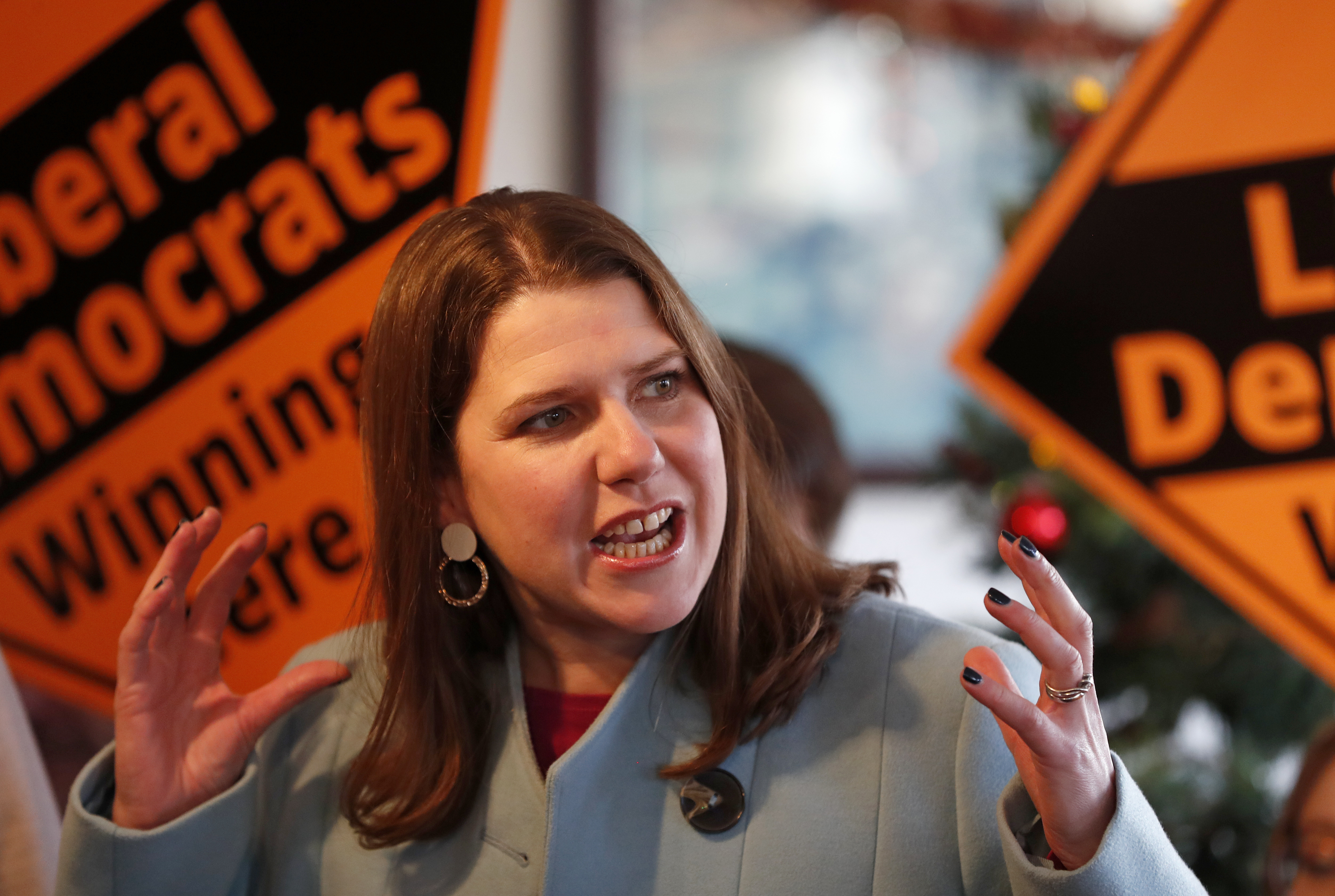 British opposition Liberal Democrats Party Leader Jo Swinson speaks as she joins activists for a final day election rally in Guildford