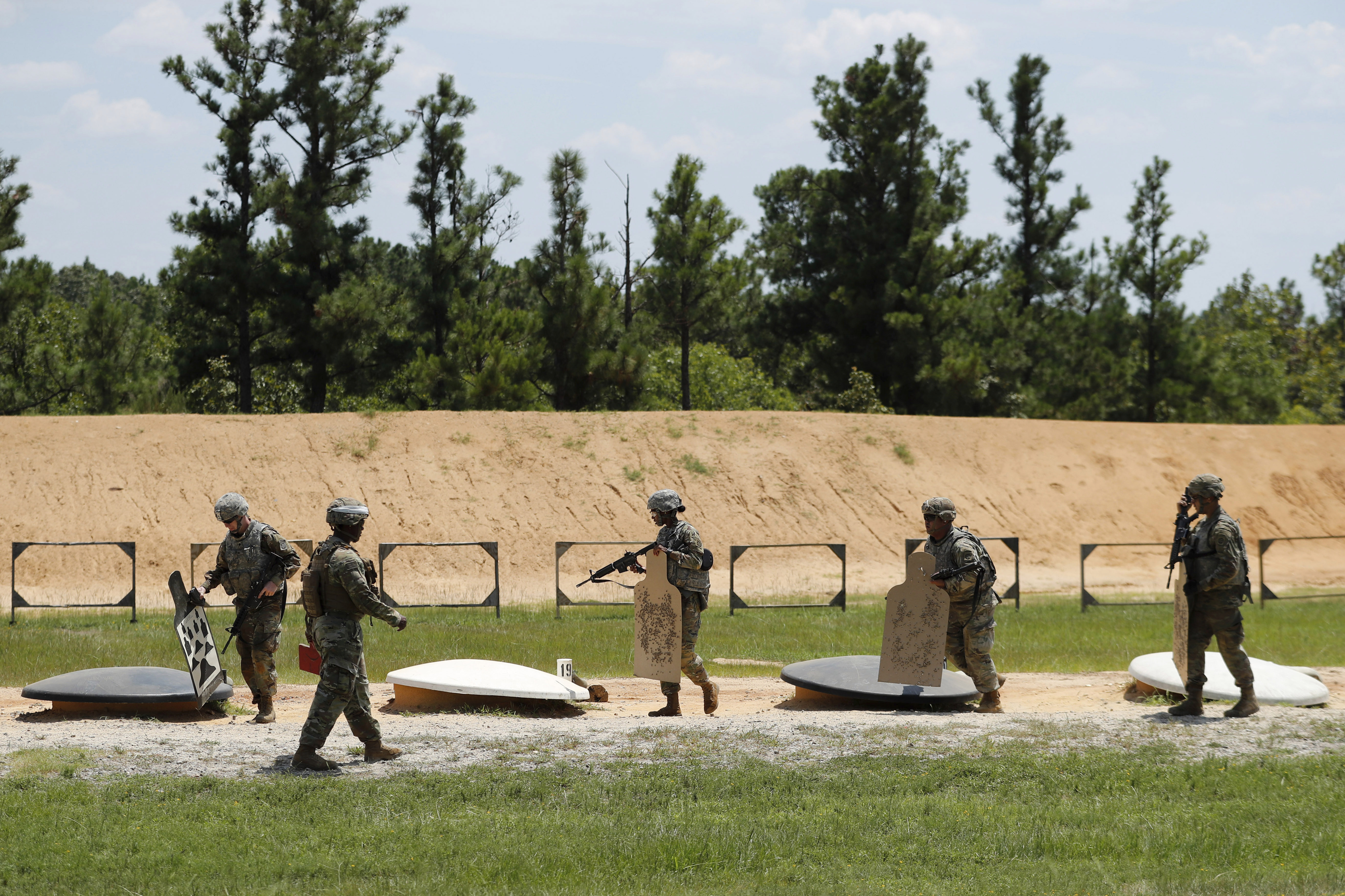 Soldiers prepare to leave a firing range at Fort Bragg in North Carolina.