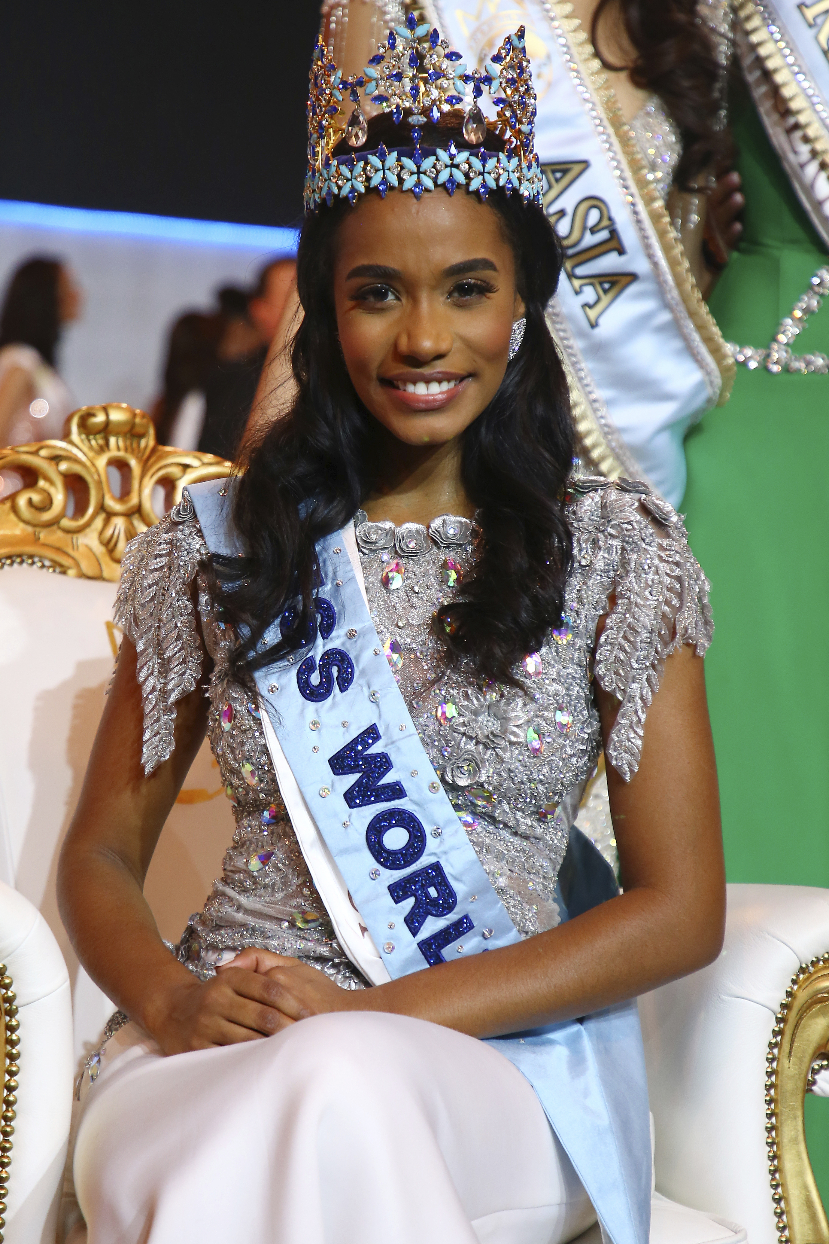 Winner of Miss World 2019, Toni-Ann Singh of Jamaica, front centre, poses for photographers at the 69th annual Miss World competition at the Excel centre in London Saturday.