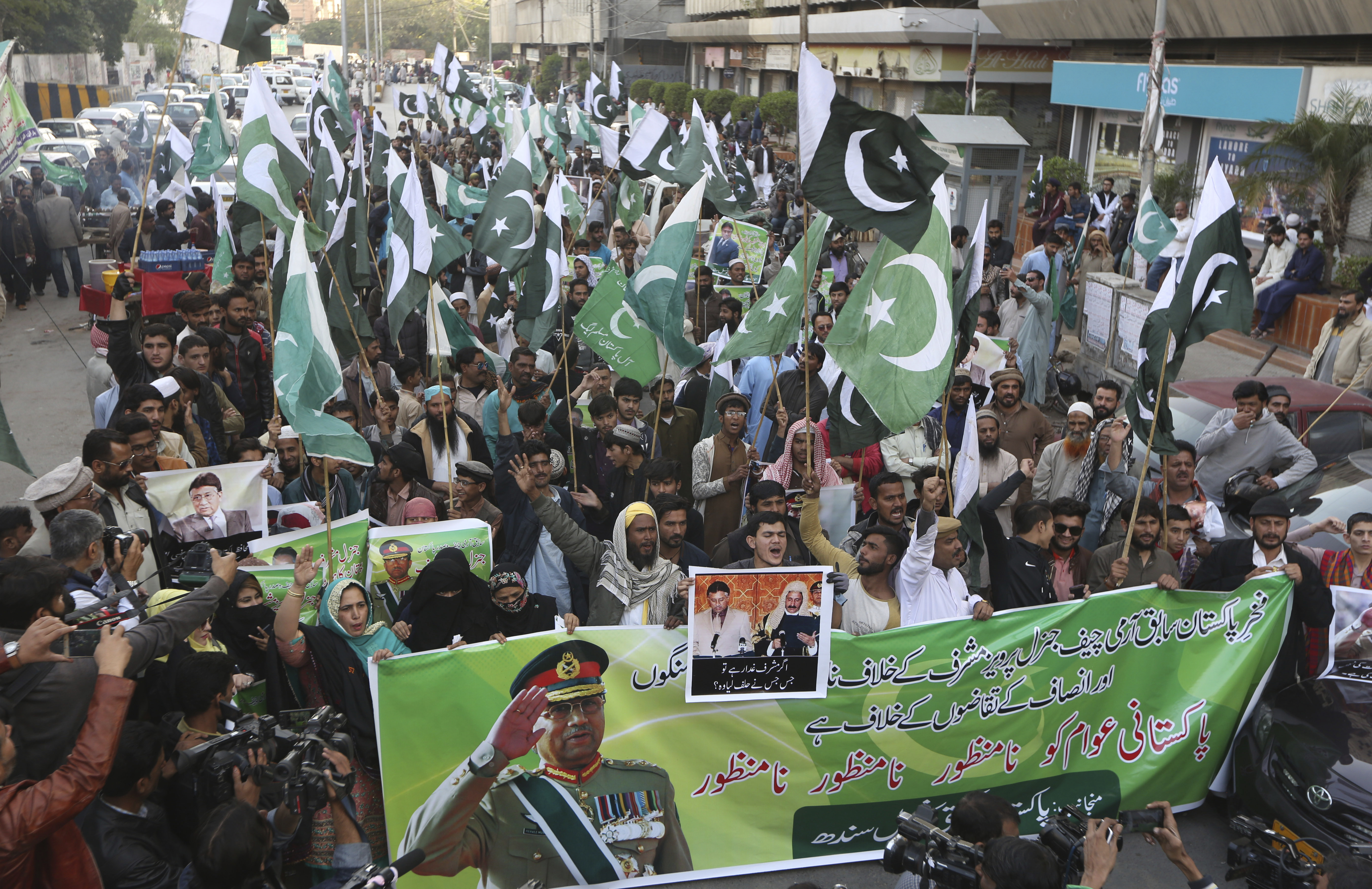 Supporters of former Pakistani military ruler Gen. Pervez Musharraf protest a court's decision in Karachi, Pakistan, on Wednesday.