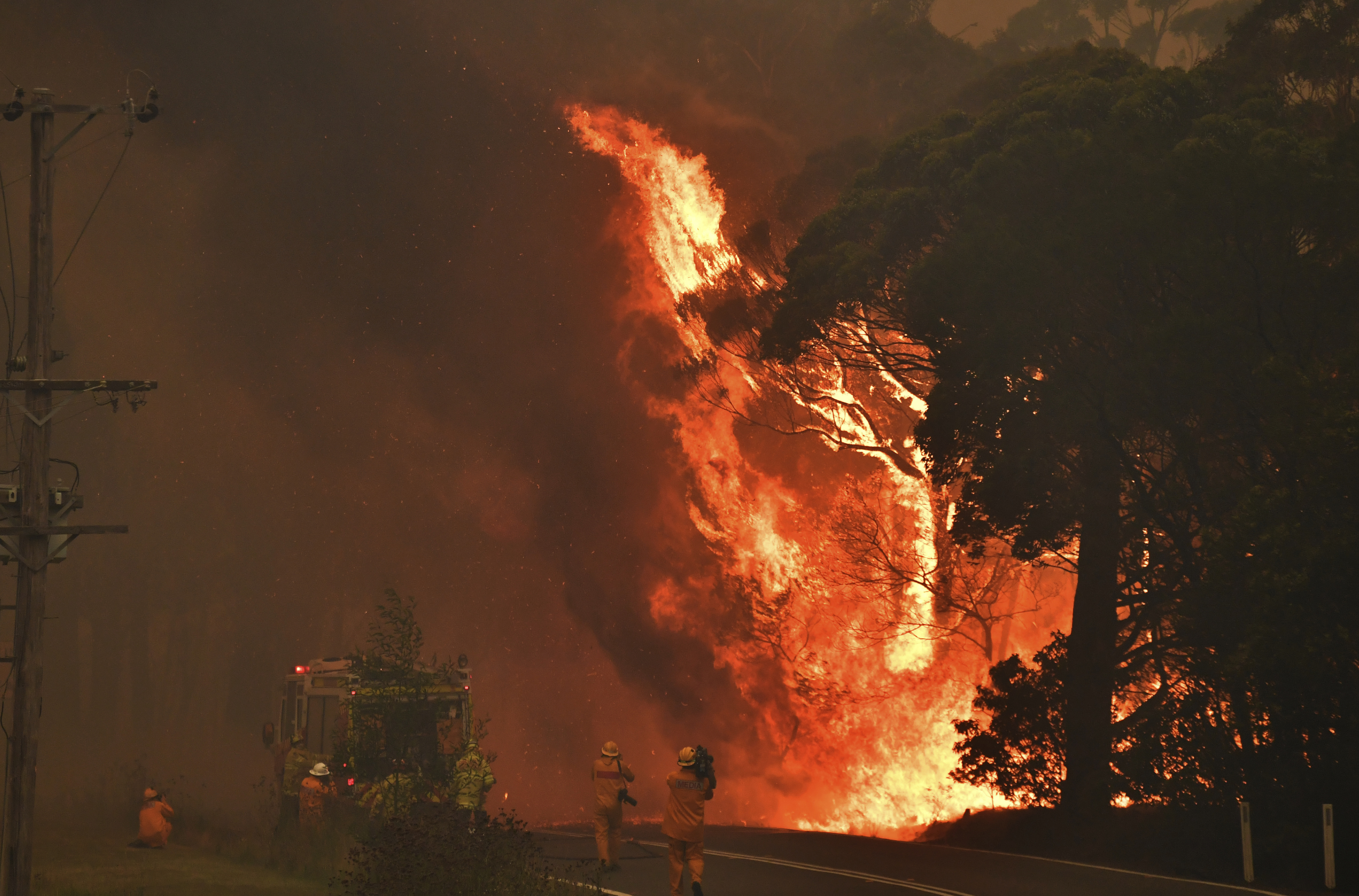 A fire truck is seen during a bushfire near Bilpin, 90 kilometersnorthwest of Sydney, on Thursday.