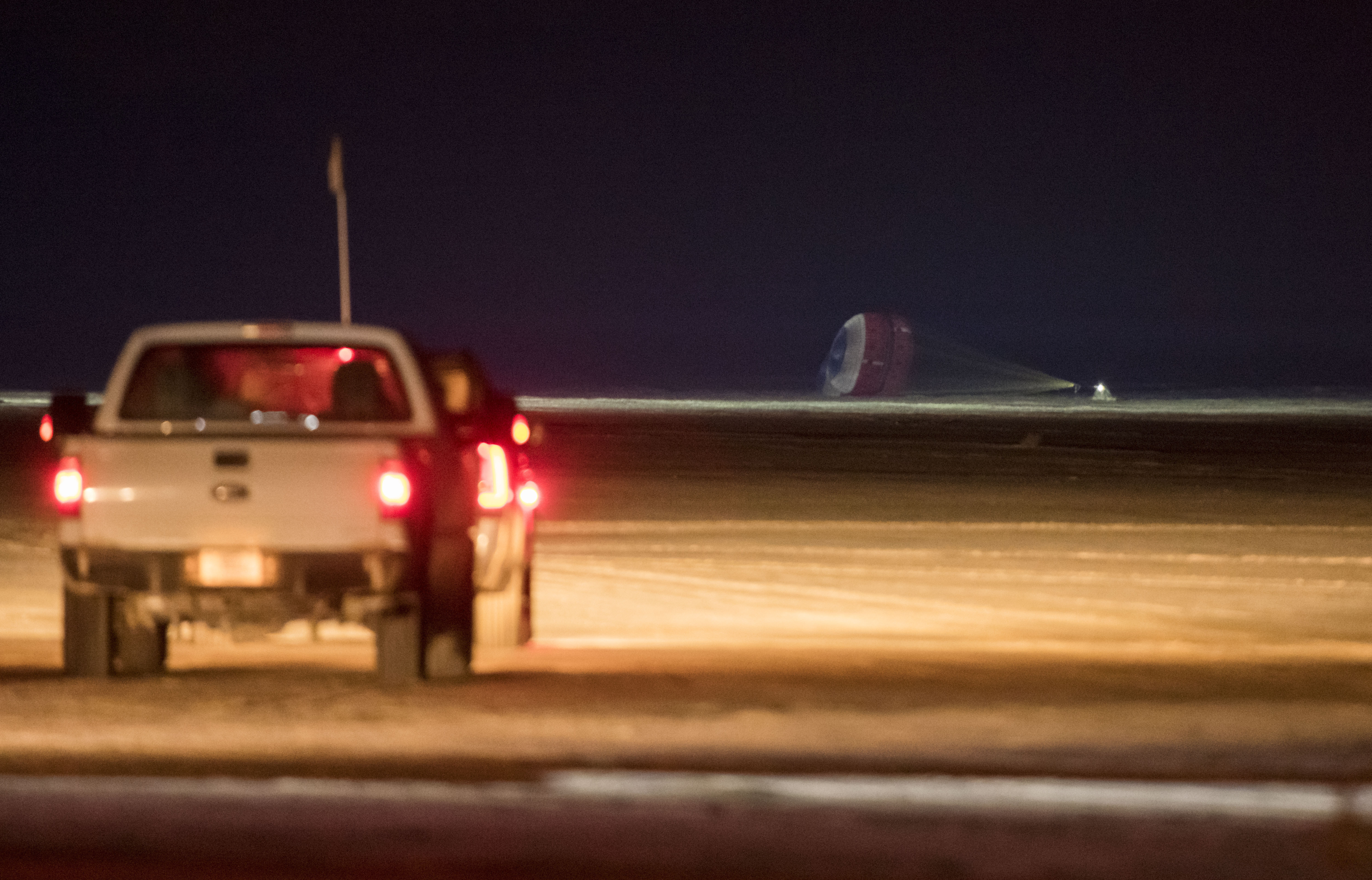 The Boeing CST-100 Starliner spacecraft lands in White Sands, New Mexico, on Sunday.
