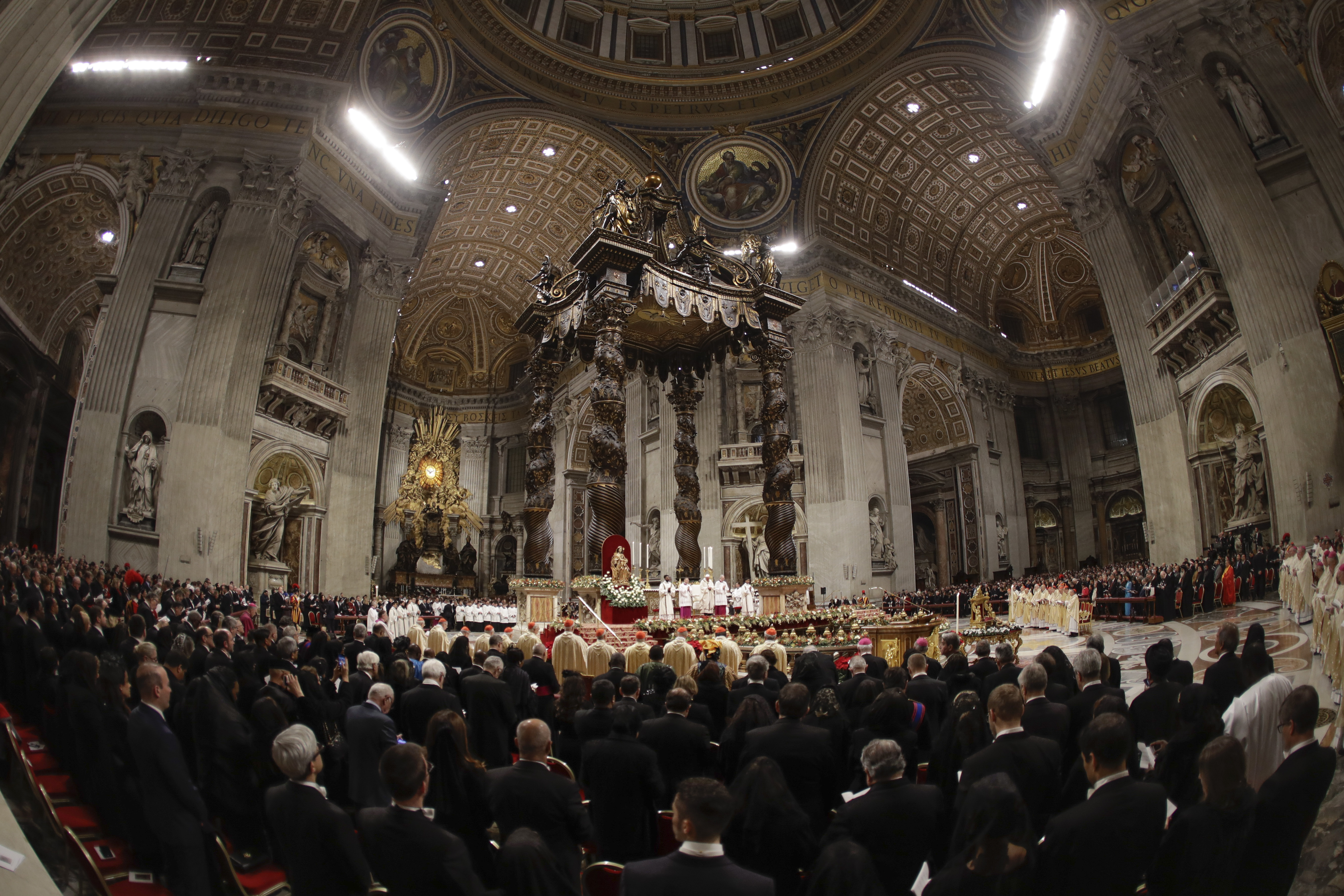 Pope Francis celebrates Christmas Eve Mass in St. Peter's Basilica at the Vatican.