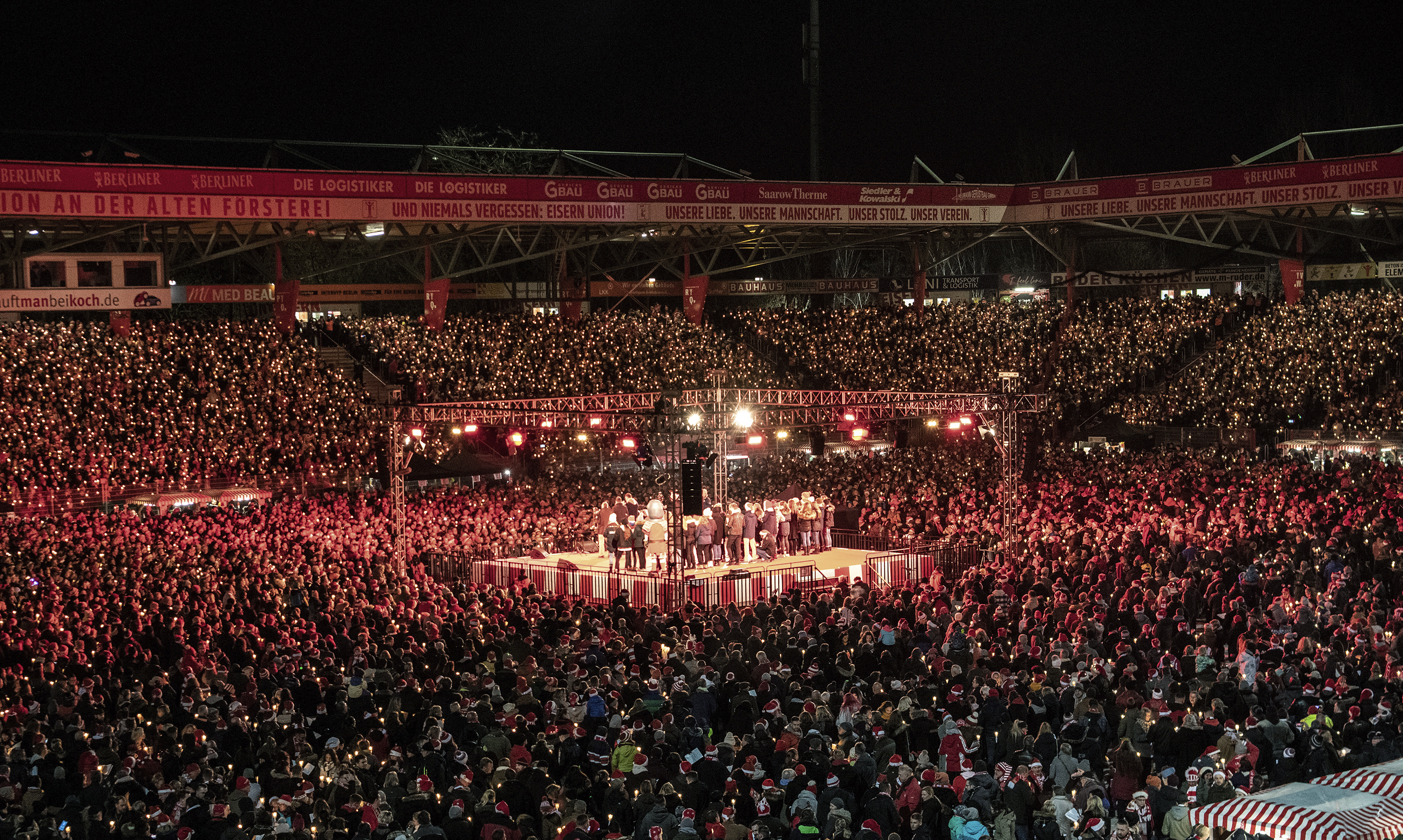 Many thousands of people take part in the Christmas carol singing event at the Alte Forsterei stadium of the German first division soccer team of 1.FC Union Berlin.