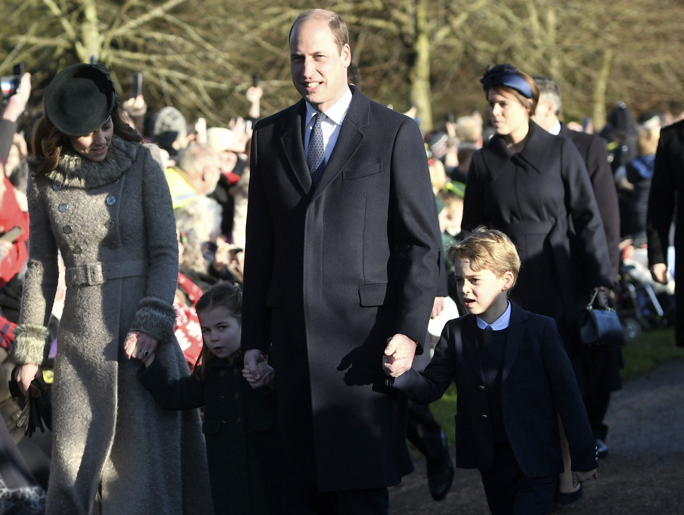 Britain's Prince George and Princess Charlotte, children of the Duke and Duchess of Cambridge after attending a Christmas day service at the St Mary Magdalene Church in Sandringham in Norfolk, England, on Wednesday.