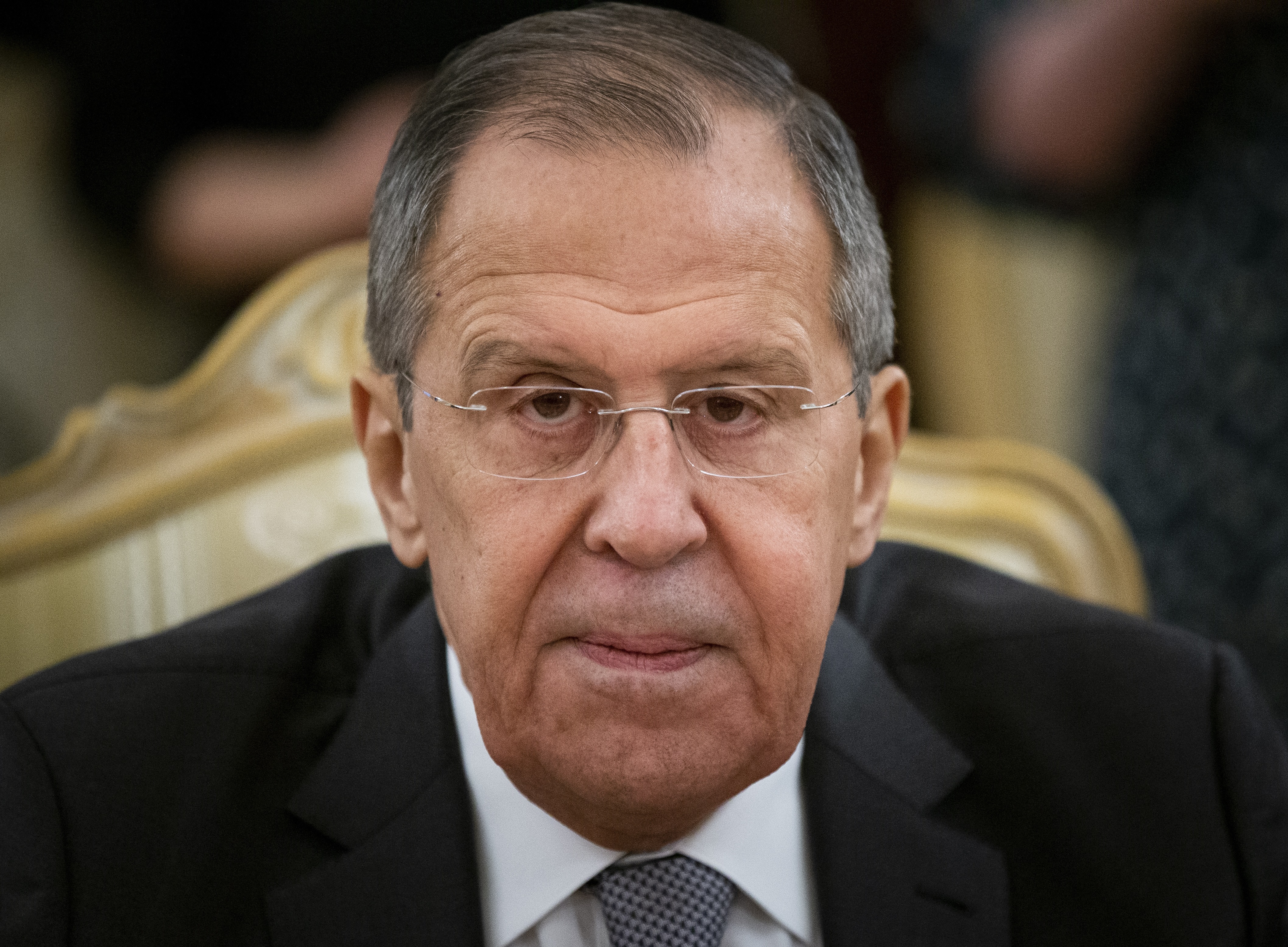 Russian Foreign Minister Sergey Lavrov listens to Iranian Foreign Minister Mohammad Javad Zarif during their talks in Moscow, Russia, on Monday.