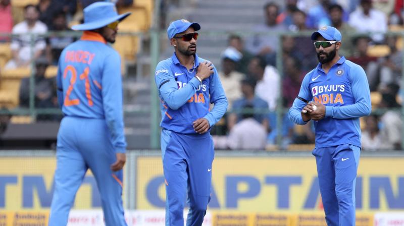 indian team players wearing black band