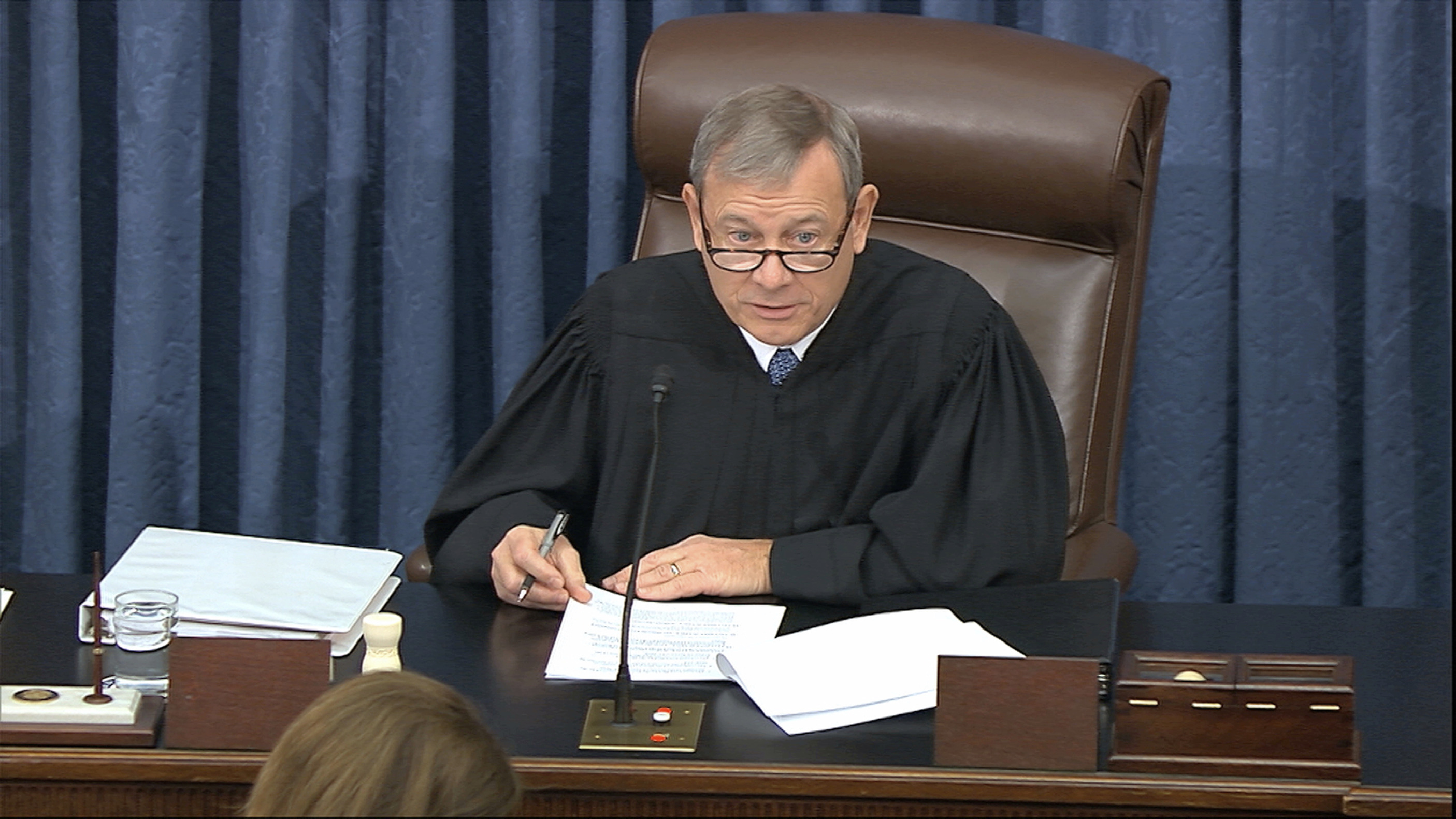 Supreme Court Chief Justice John Roberts speaks during the impeachment trial against President Donald Trump in the Senate at the U.S. Capitol in Washington, on Tuesday.