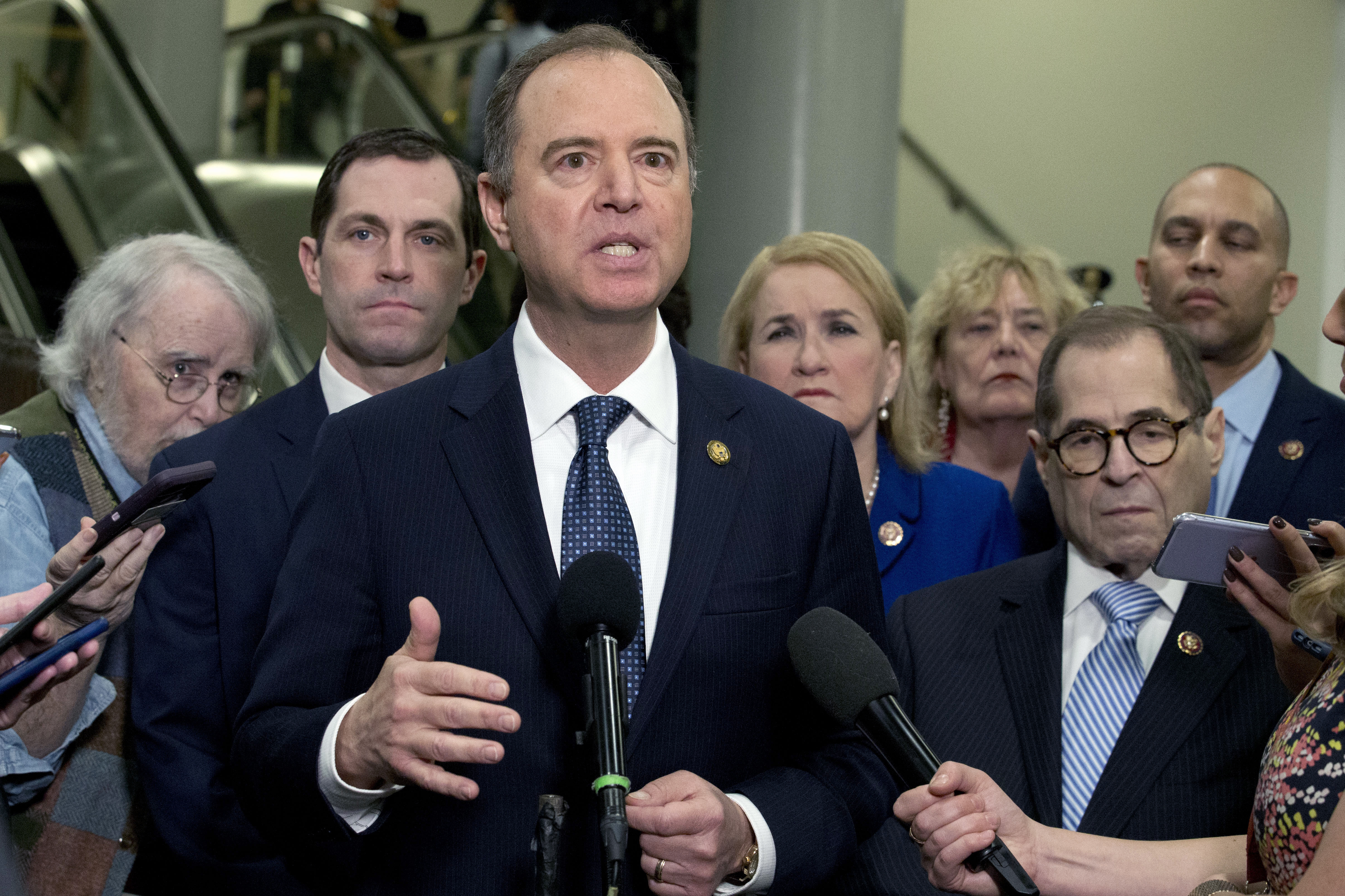 House Intelligence Committee Chairman Adam Schiff, D-Calif., accompanied by the impeachment managers House Judiciary Committee Chairman, Rep. Jerrold Nadler, D-N.Y., Rep. Hakeem Jeffries, D-N.Y., Rep. Sylvia Garcia, D-Texas, Rep. Zoe Lofgren, D-Calif., and Rep. Jason Crow, D-Colo. speaks to reporters, on Capitol Hill in Washington, on Wednesday.