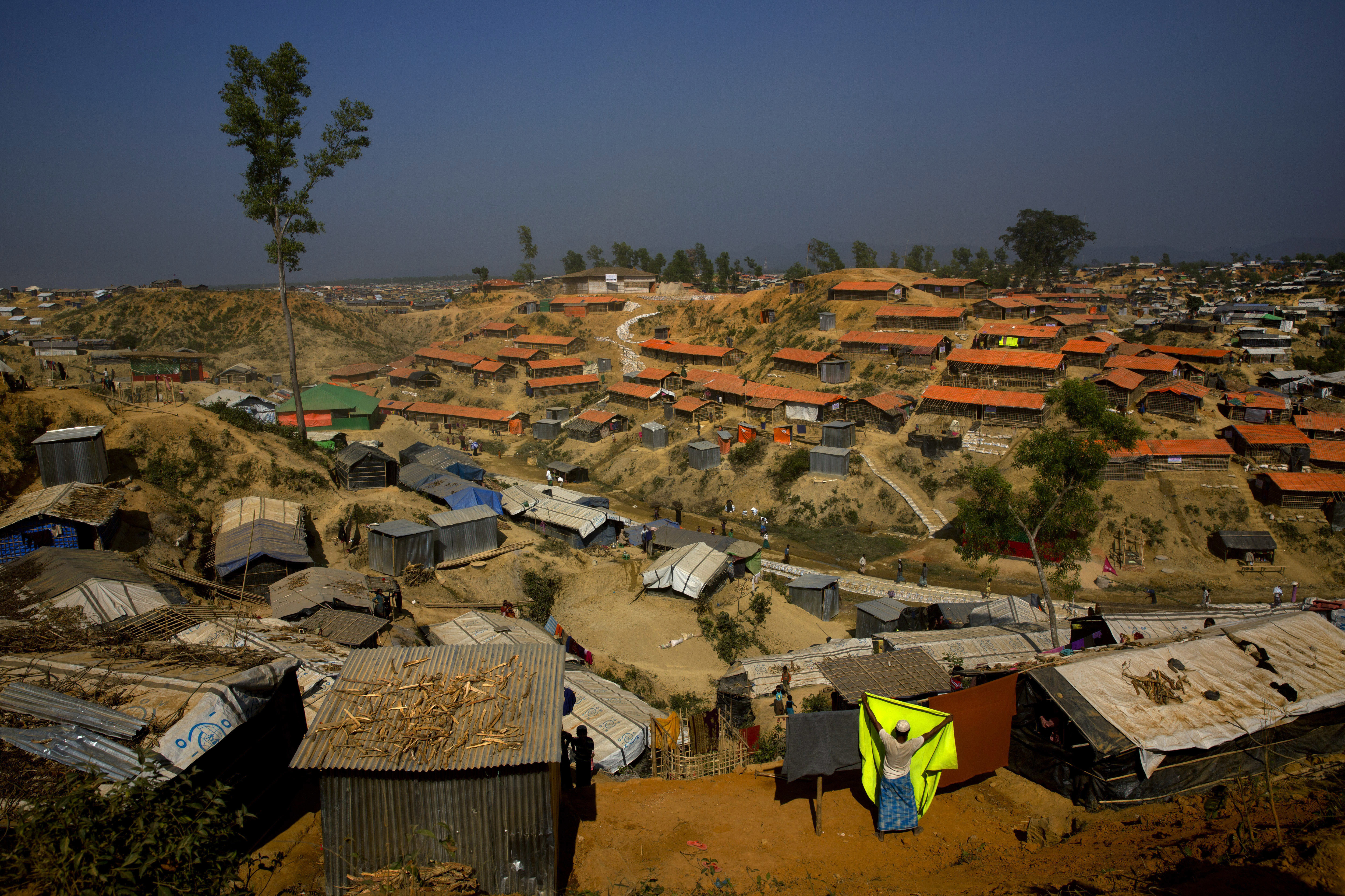File photo: A Rohingya refugee hangs a blanket out to dry at Balukhali refugee camp, about 50 kilometers (32 miles) from Cox's Bazar, Bangladesh.