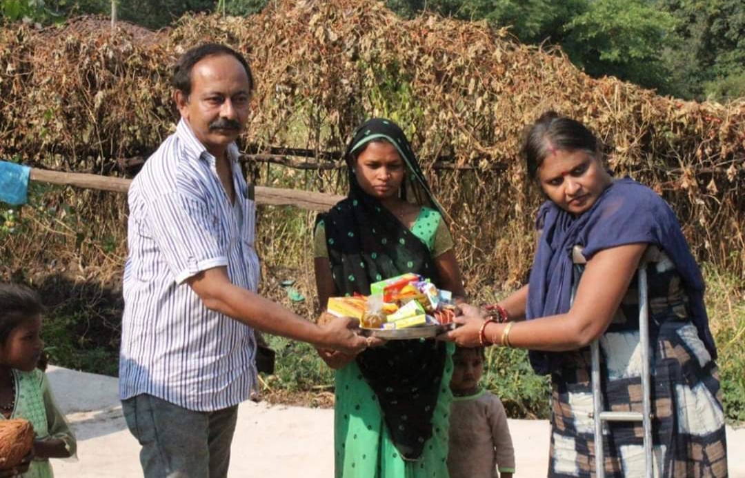 Madhu gives gifts to poor families