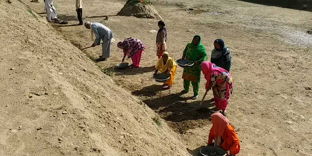 Women made a big pond in forest at nahan