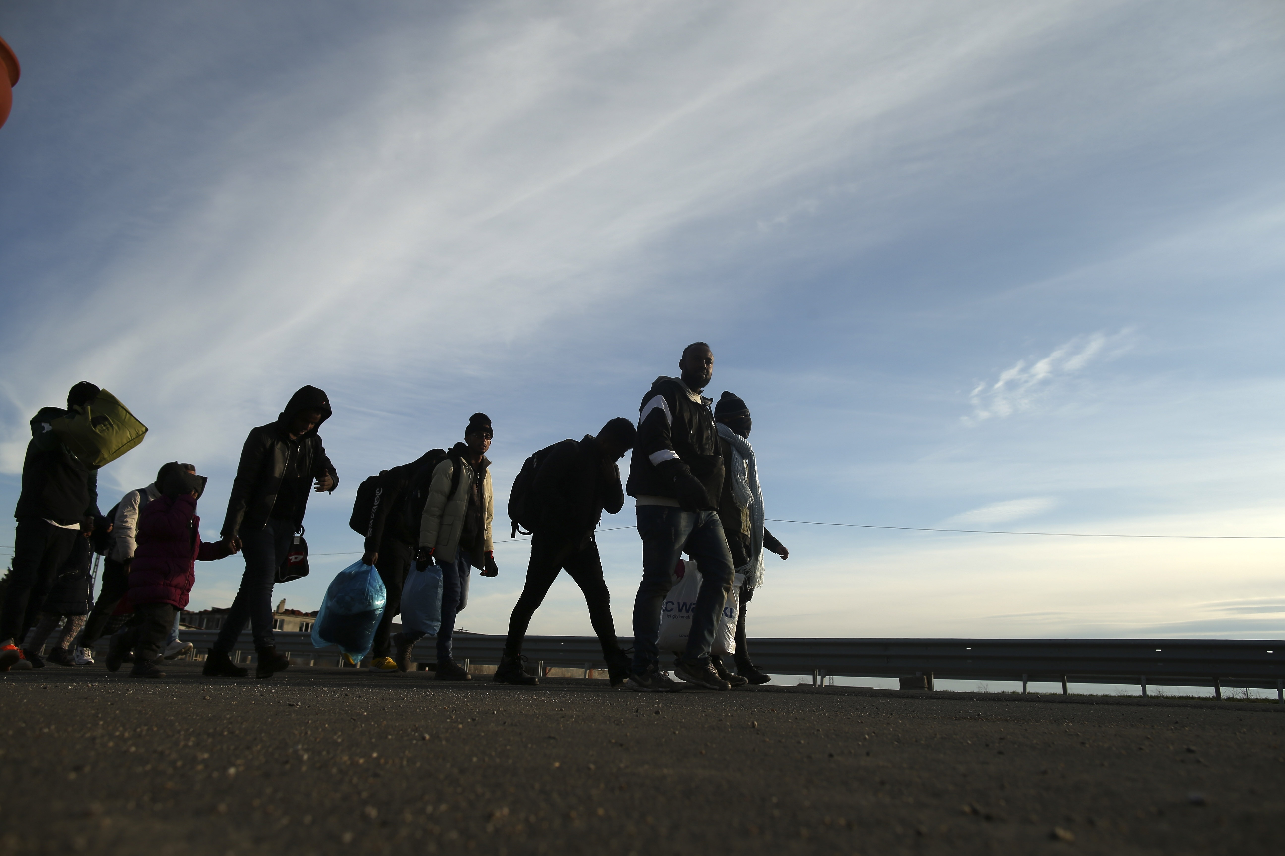 Migrants walk in Edirne, near the Turkish-Greek border on Friday.