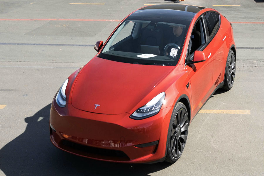 red Model Y. Courtesy, Tesla