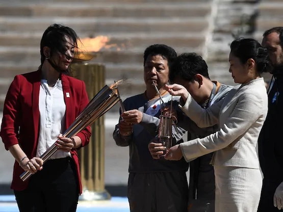 Greece handed over the Olympic flame to Tokyo 2020 organizers at a ceremony held behind closed doors