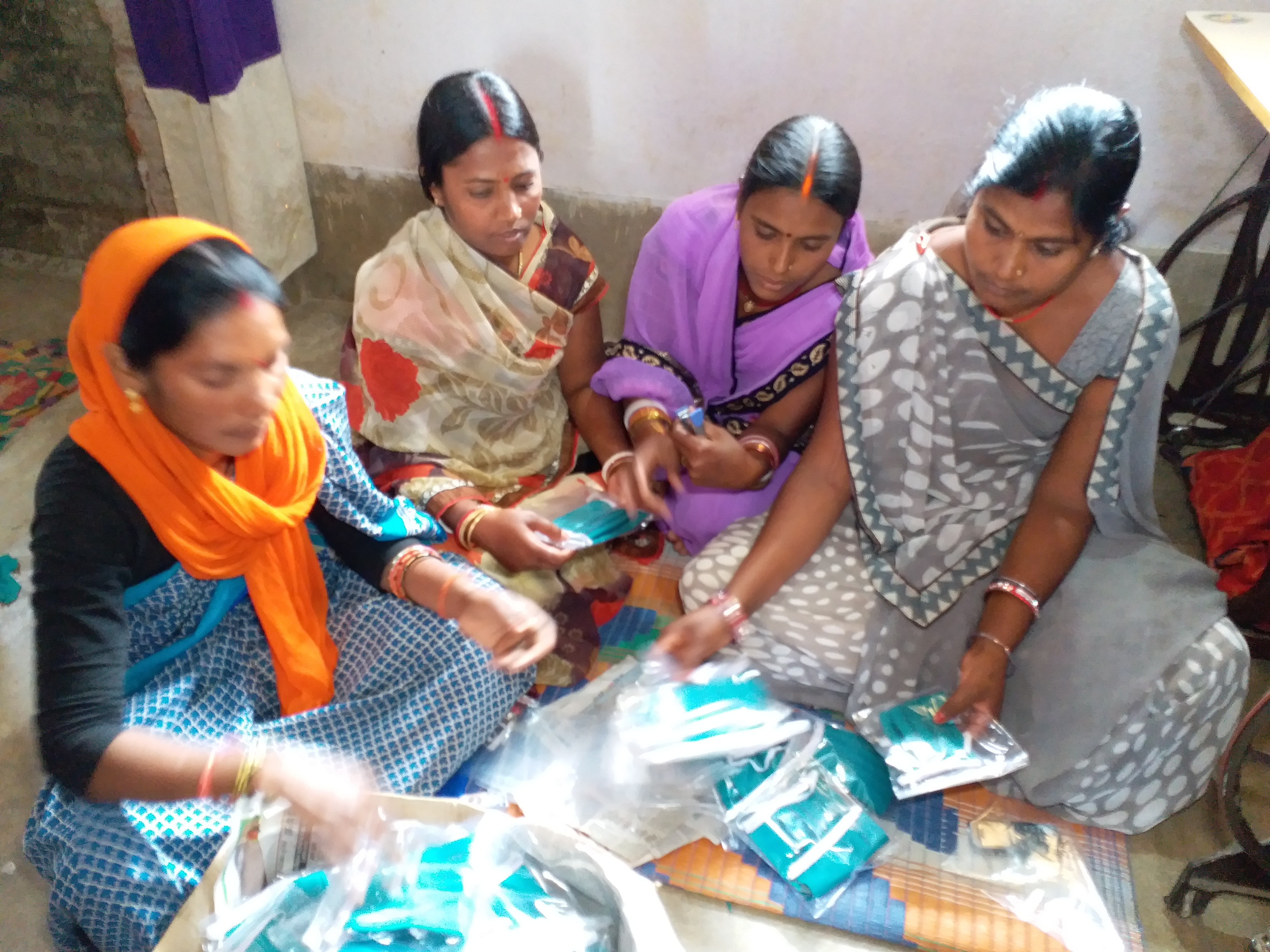 Women of Daru village of Hazaribag are making masks to fight with corona virus