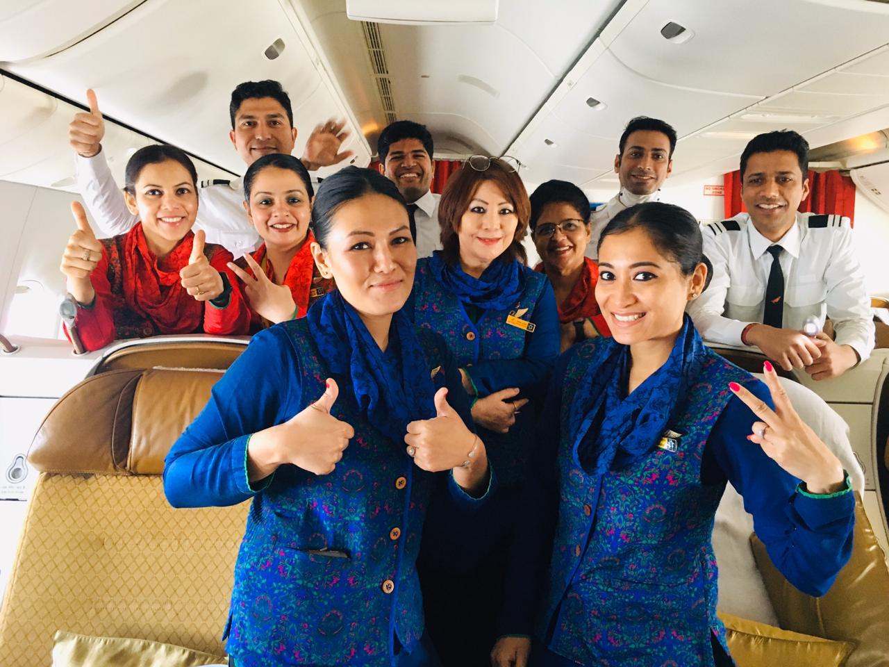 Air India crew posing after a successful evacuation of 263 Indian students