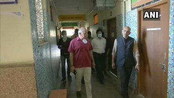 Delhi Deputy CM visits Sarvodaya school converted into temporary night shelter