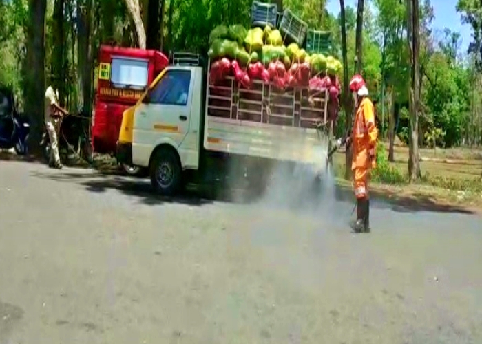 Vehicles with essential commodities being sanitised in Kerala