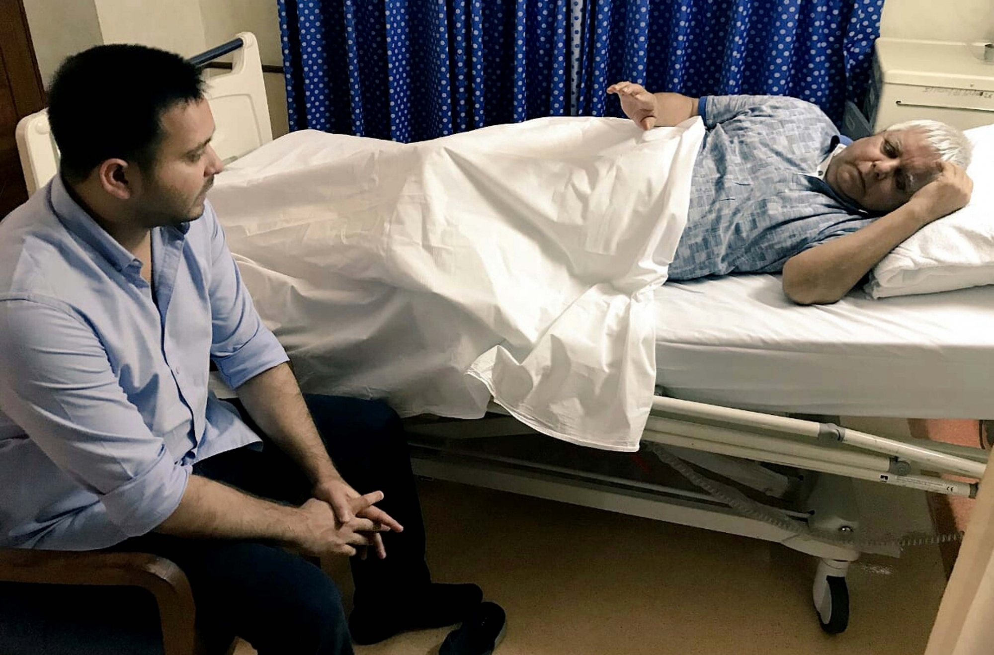 RJD Chief Lalu Prasad along with his son at a hospital in Ranchi