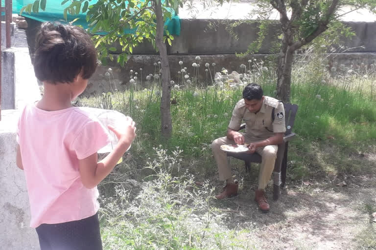 Outside the house in Sheopur, father kept eating food