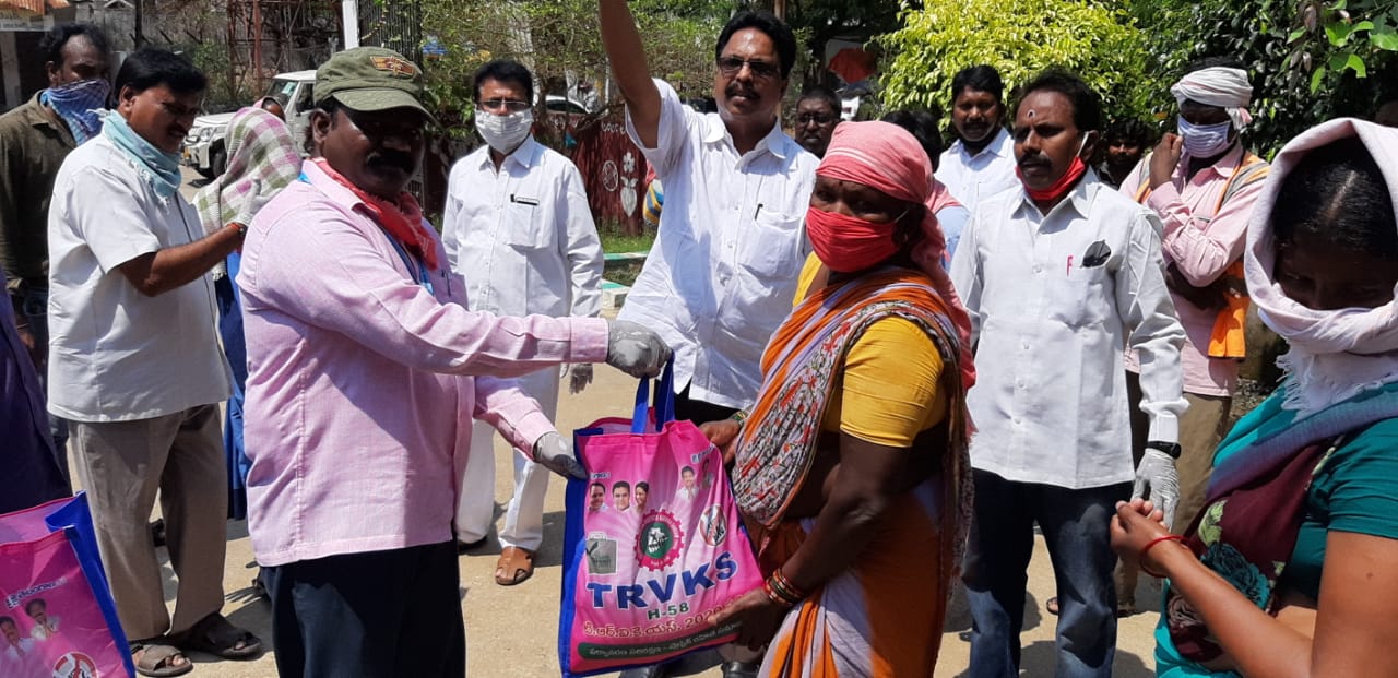 distribution of daily essentials to the poor municipal workers by the electric employees in palvancha bhadradri kothagudem