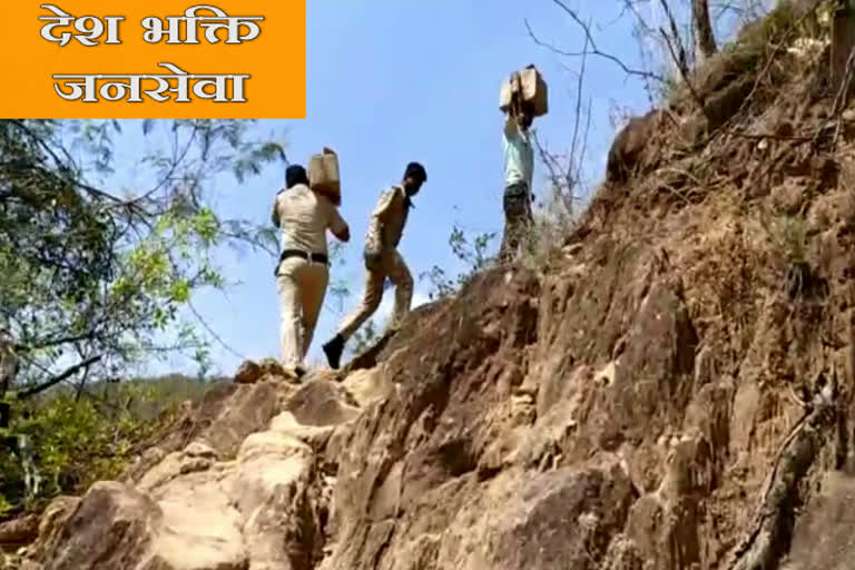 Police jawans reach 1800 feet high hill food