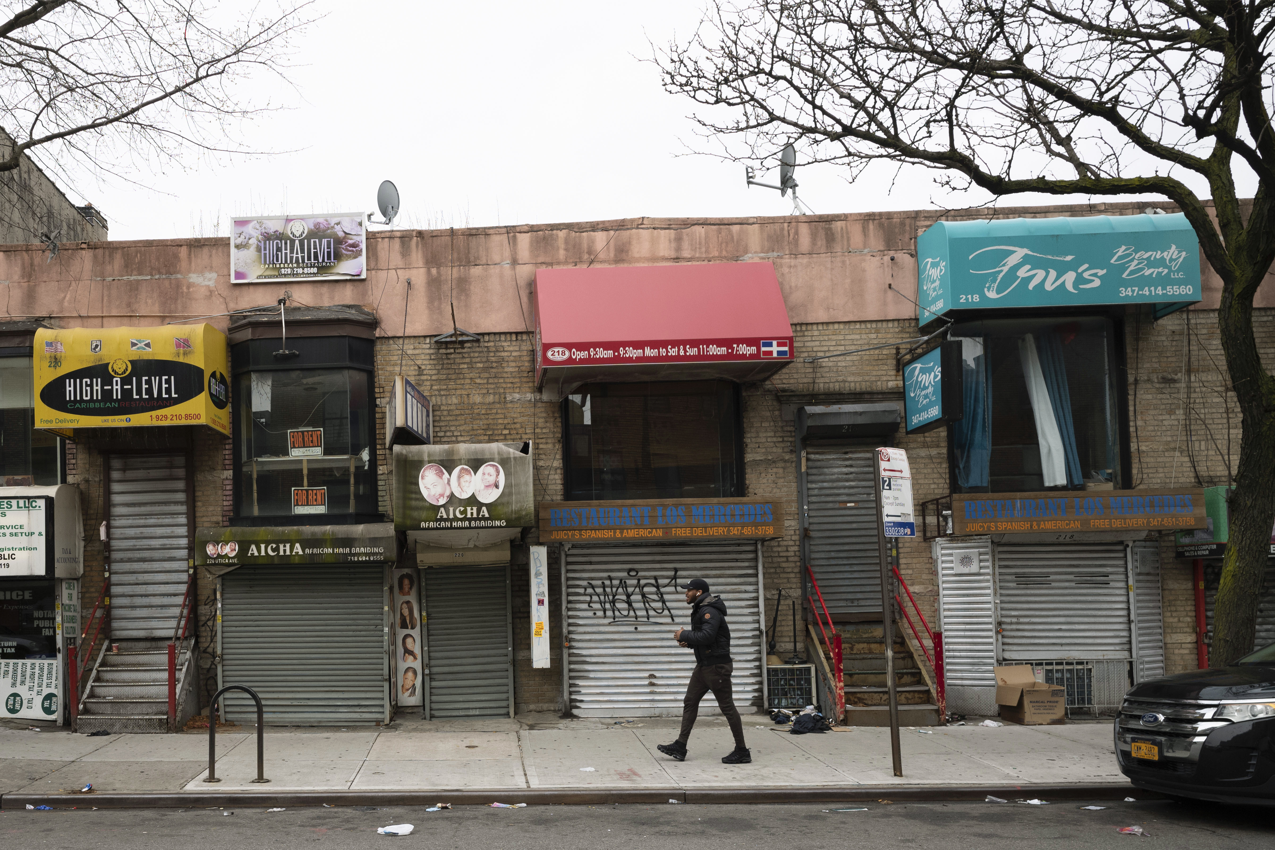 Small businesses are shuttered closed during the coronavirus epidemic in the Crown Heights neighborhood of the Brooklyn borough in New York