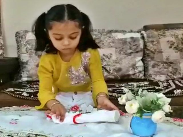 girl making mask