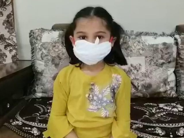 girl making mask