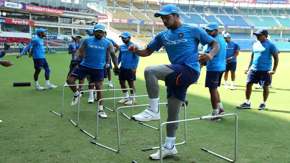 Indian cricketers practice