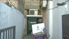 People line up at a liquor shop in Bengaluru as state government permits the sale of liquor