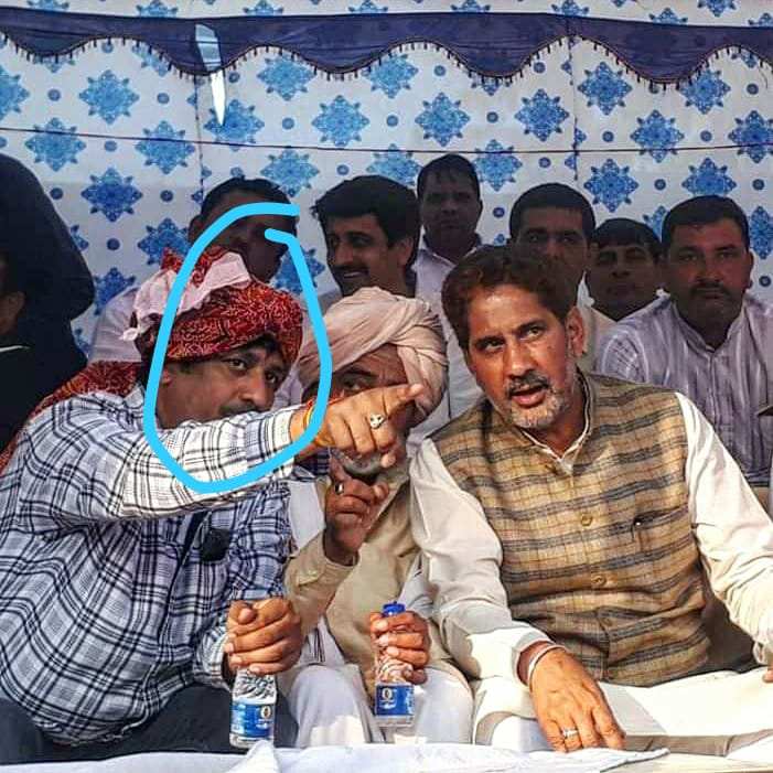 viral photos of bhupendra thekedar with minister in sonipat liquor scam