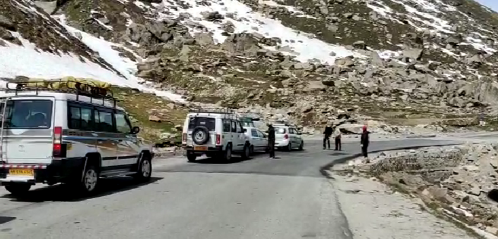 Administration and  Young Drukpa Association sanitizing vehicles in Lahaul Spiti