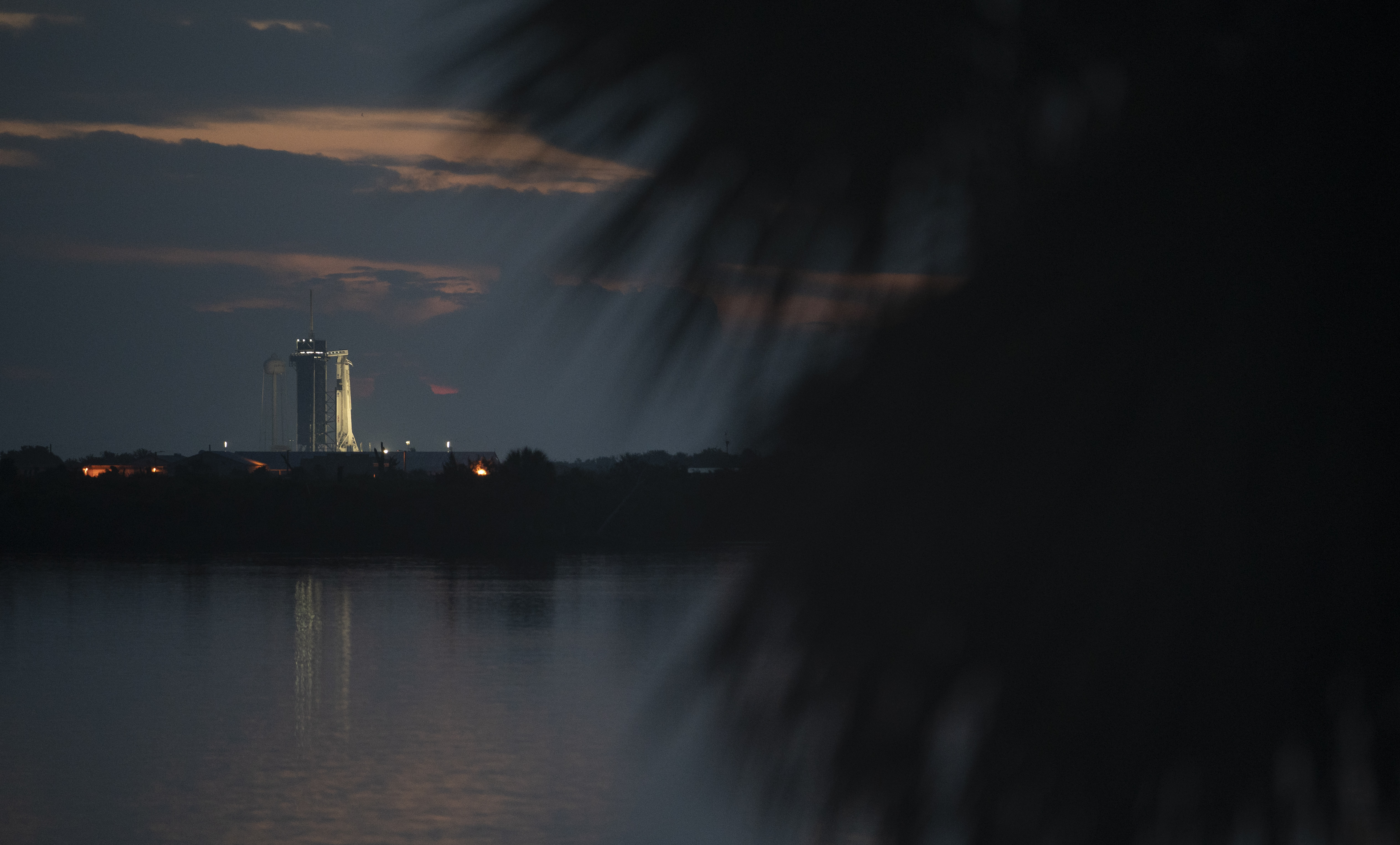 The SpaceX Falcon 9, with the Crew Dragon spacecraft on top of the rocket, sits on Launch Pad 39-A on Wednesday at Kennedy Space Center in Cape Canaveral.