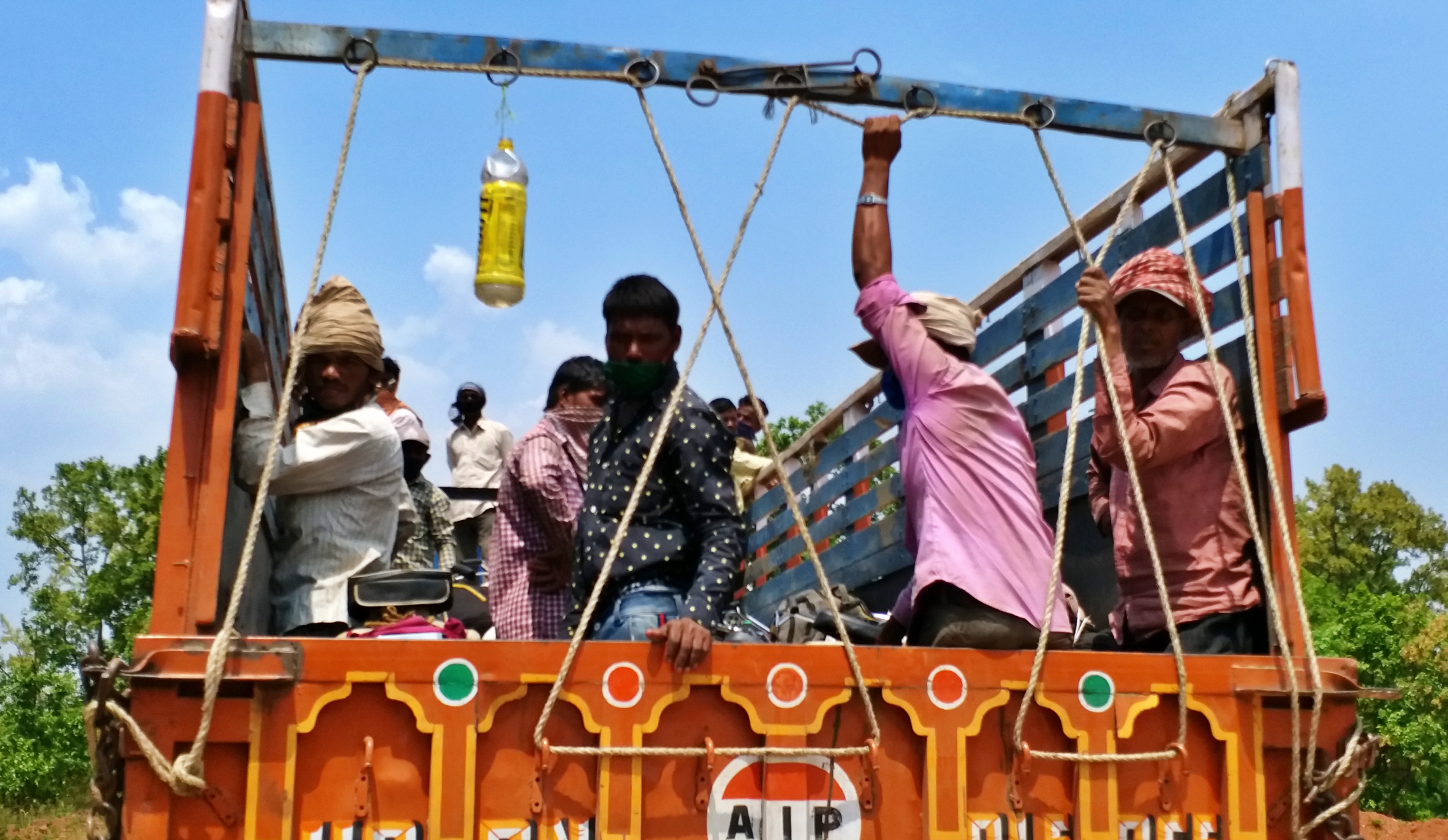 labourer going home with help of truck