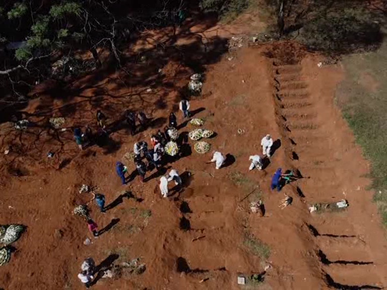 largest cemetery outside Sao Paulo, Vila Formosa, is operating at an unprecedented rate to cope with the large number of people dying from COVID-19.