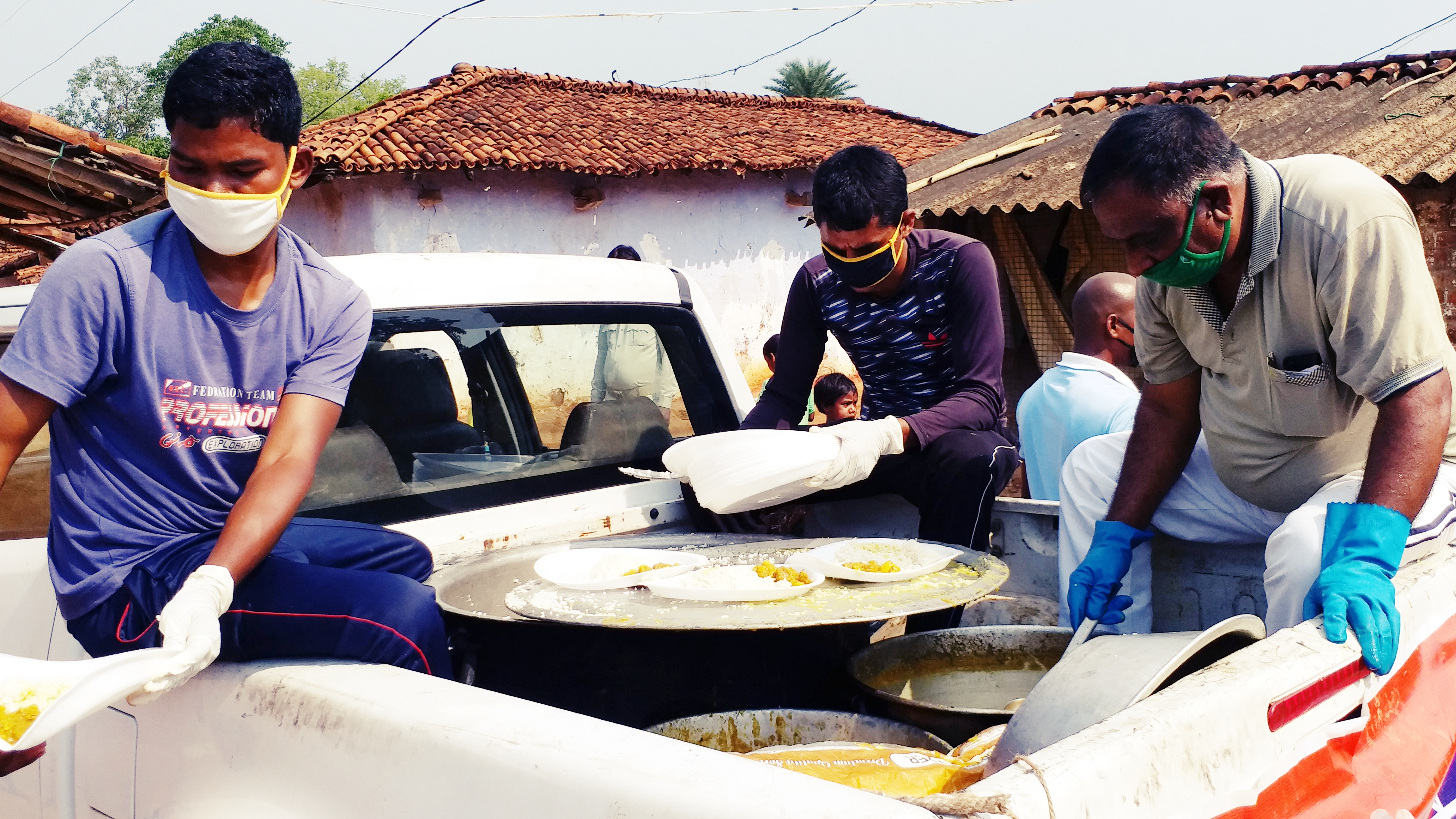 Police feeding food to remote villagers