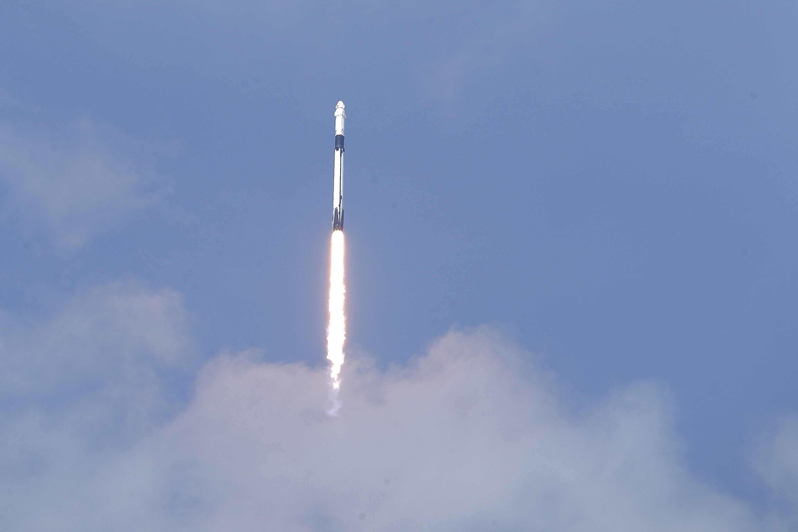 A SpaceX Falcon 9, with NASA astronauts Doug Hurley and Bob Behnken in the Dragon crew capsule, lifts off from Pad 39-A at the Kennedy Space Center in Cape Canaveral, on Saturday.