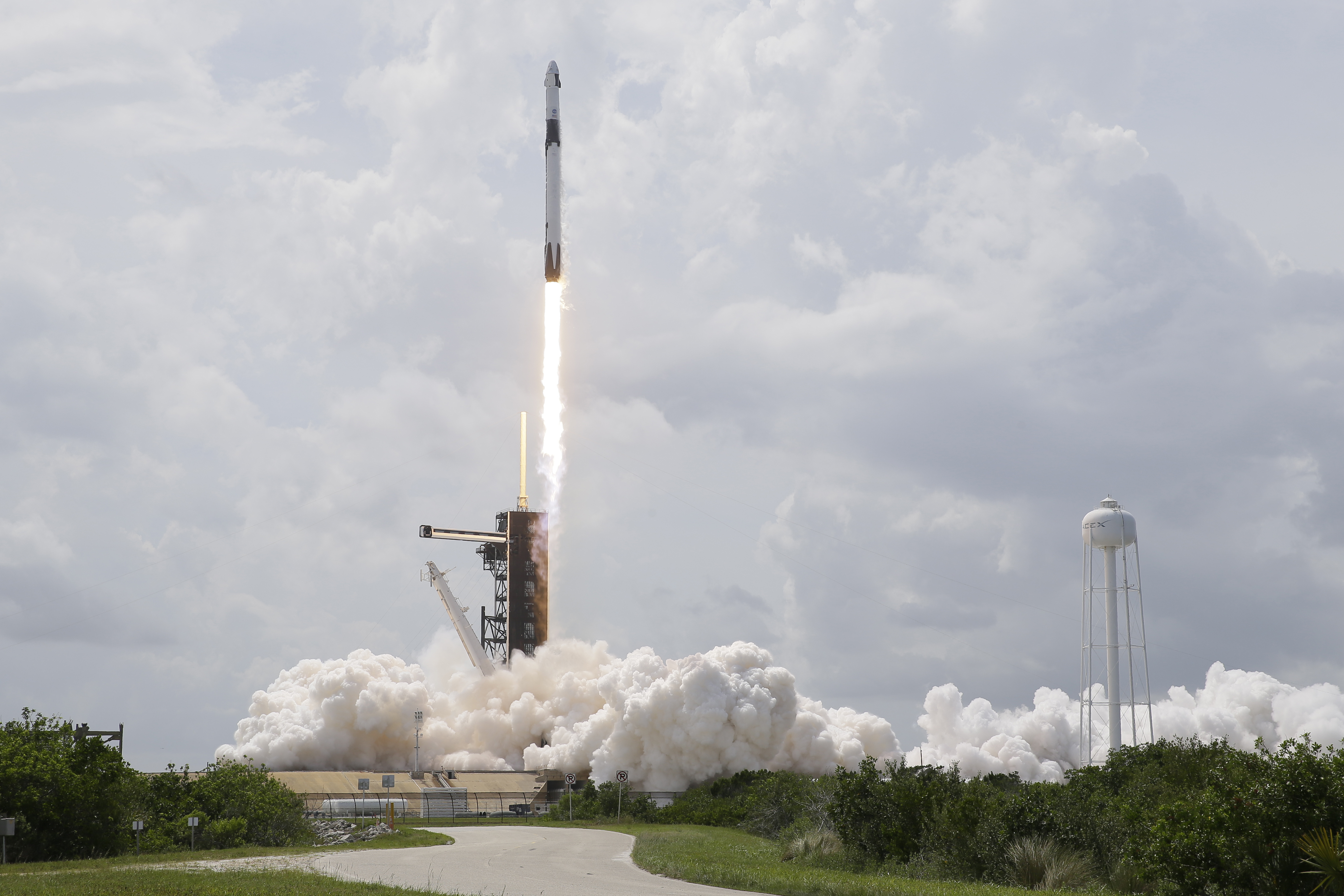 A SpaceX Falcon 9, with NASA astronauts Doug Hurley and Bob Behnken in the Dragon crew capsule, lifts off from Pad 39-A at the Kennedy Space Center in Cape Canaveral, on Saturday.