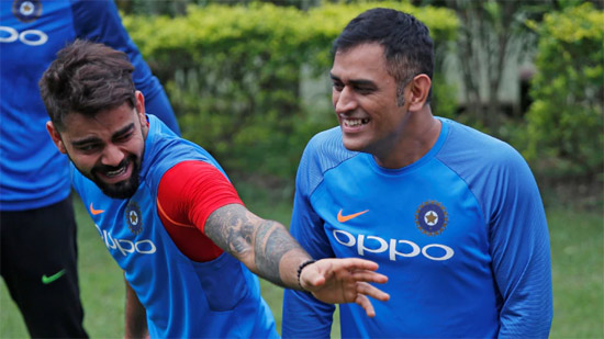 KOHLI WITH DHONI