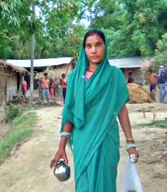 troubled by financial hardship, the woman is cutting hair and shaving