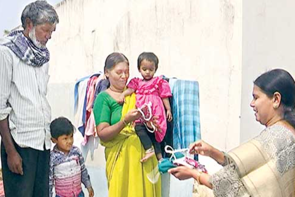 kothapalli mptc designed masks with cotton saris in rangareddy district