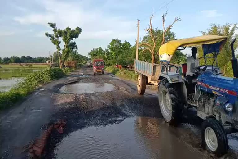 Road damage in Raiganj