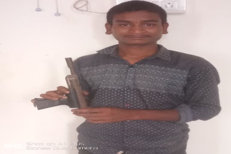 jorhat police arrested  with gun golap das 